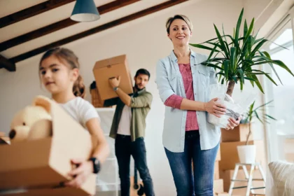 below-view-of-a-family-moving-into-new-home-2023-11-27-05-16-21-utc-420x280